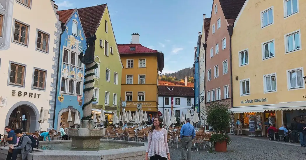 A woman enjoying the town views of Altstadt in Fussen