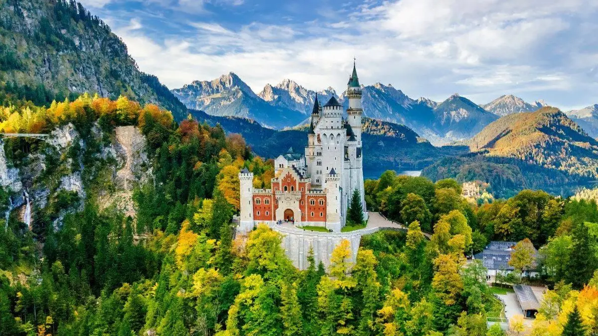 A scenic aerial view of Neuschwanstein Castle A scenic aerial view of Neuschwanstein Castle